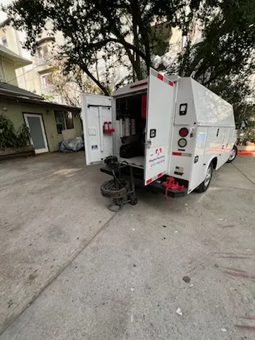 Magnet Plumbing service vehicle on-site for Sewer Line Repair in Braeswood Place